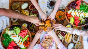 Top view of a colorful breakfast spread in Dubai featuring Persian-inspired dishes