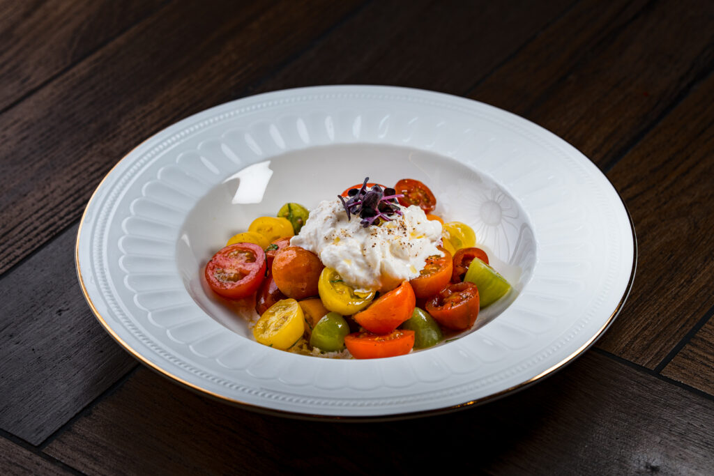 Fresh salad arrangement in a white plate
